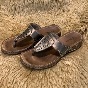 Clarks bronze colored leather upper sandals in VGUC. SZ 6 1/2. Heel is 1 1/4”.